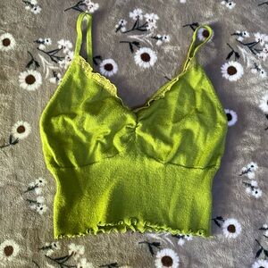 Green soft crop tank with lace lining, fitted but can stretch
